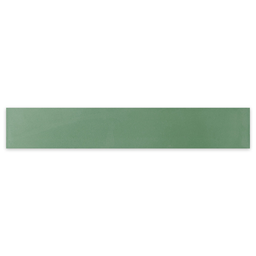 The 2X12-Solid Gemstone Green tile sample by New York Cement Tile is rectangular, green, and smooth.