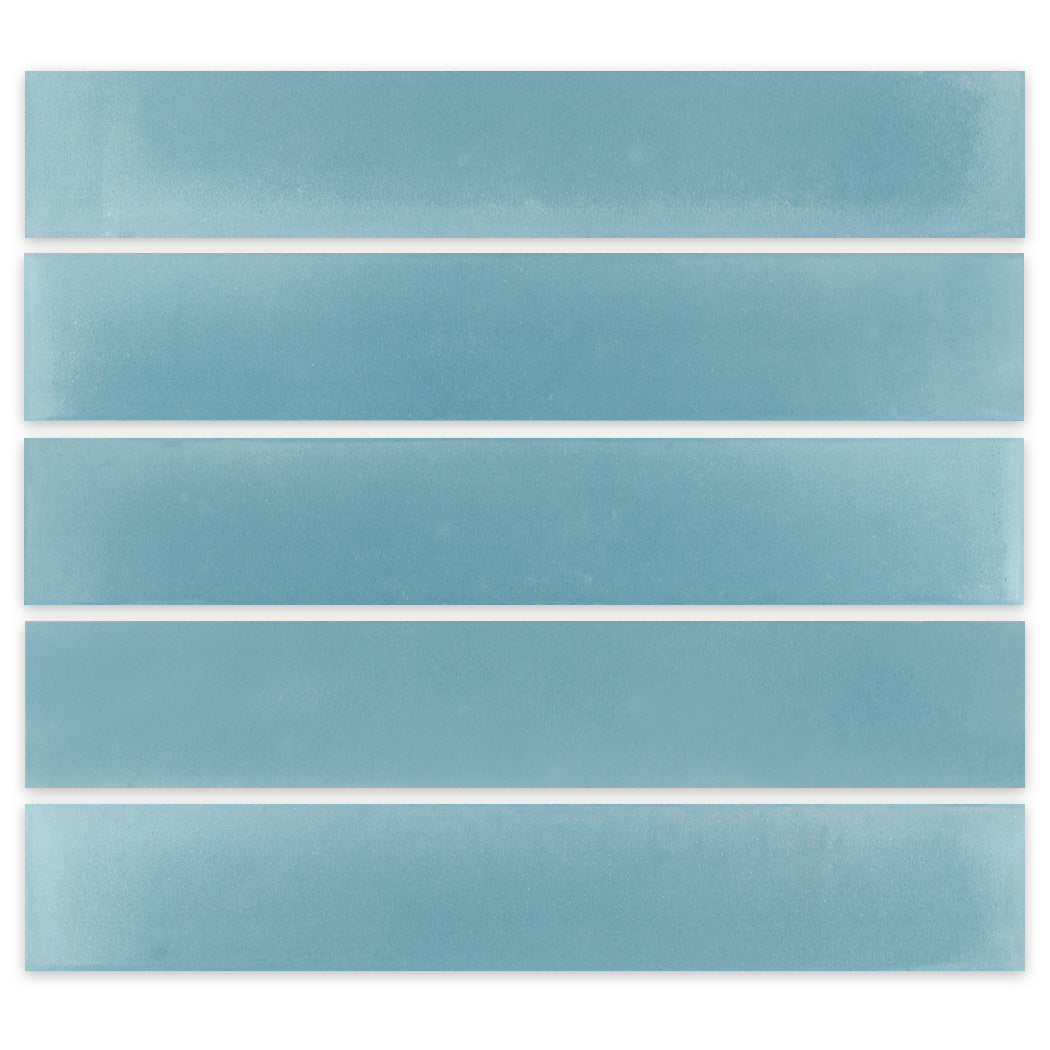 Five 2X12-Solid Slate Sky tiles by New York Cement Tile are aligned in parallel rows on a white background.
