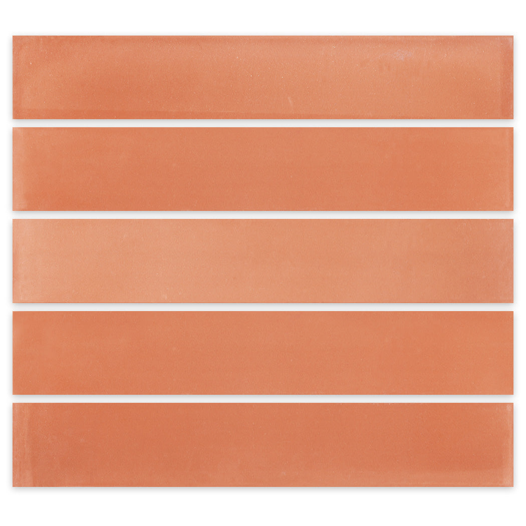 Five 2X12-Solid Terracotta tiles from New York Cement Tile shown in parallel rows on a white background.