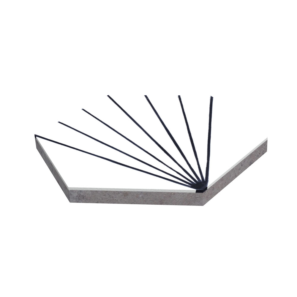 The NH23-036 White Sample by New York Cement Tile features black lines rising from a partially open book, like flipping pages.