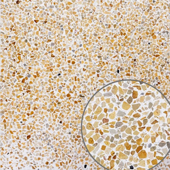Close-up of TERRAZZO 24X24-Cane by New York Cement Tile, showing tan, yellow & gray chips with a magnified detail.