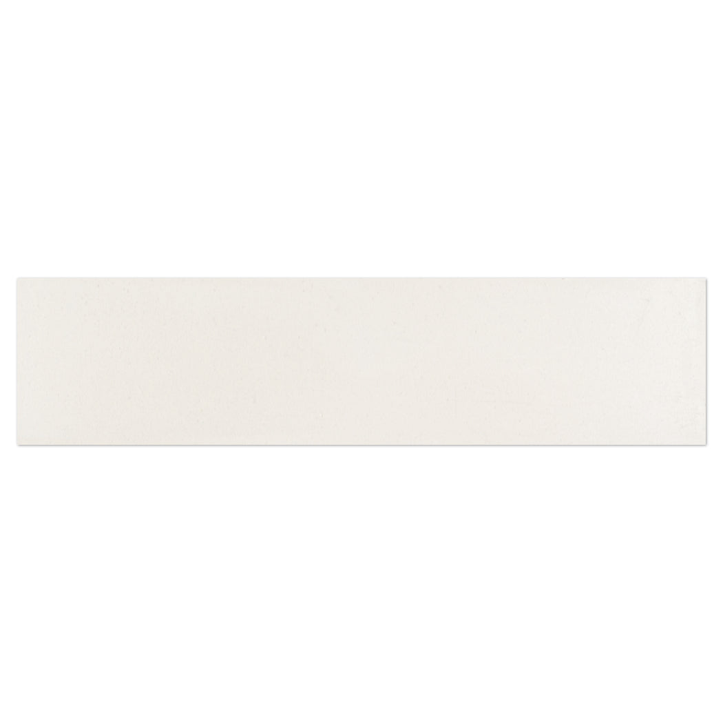 A rectangular 2X8 Beach Beige cement tile sample by New York Cement Tile, smooth and plain, on a white background.