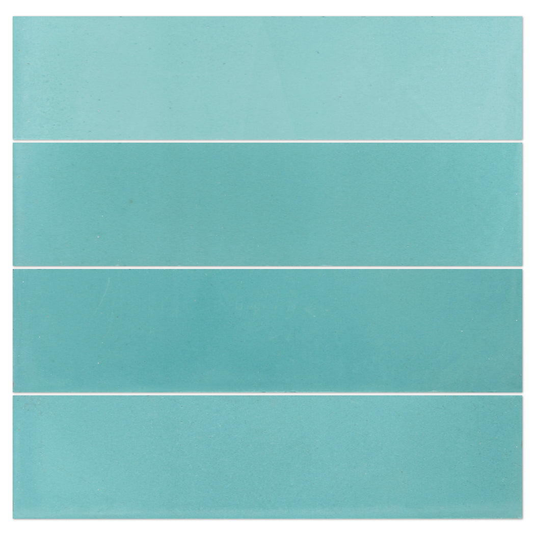 Five aqua blue swatches of 2X8-Solid Coastal Sky by New York Cement Tile, great for accent walls or backsplash ideas.