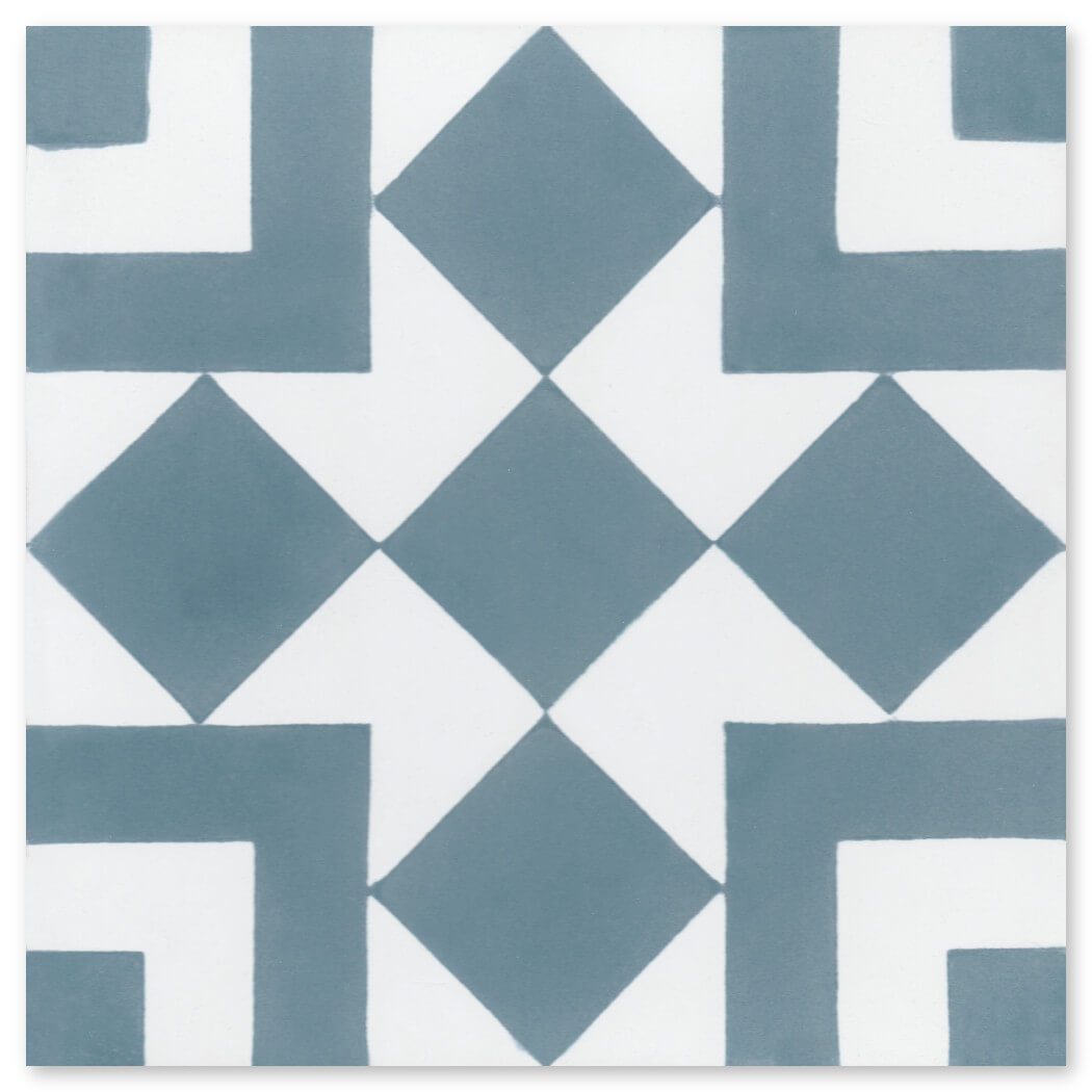 The N20-217 by New York Cement Tile features blue squares and diamonds in a geometric pattern on a white background.