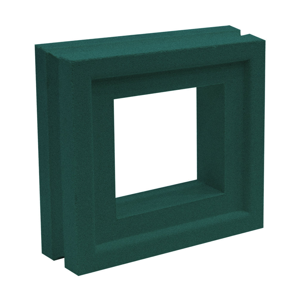 The Arbie Sample by New York Cement Tile is a green, foam square frame with thick edges, upright on a white surface.