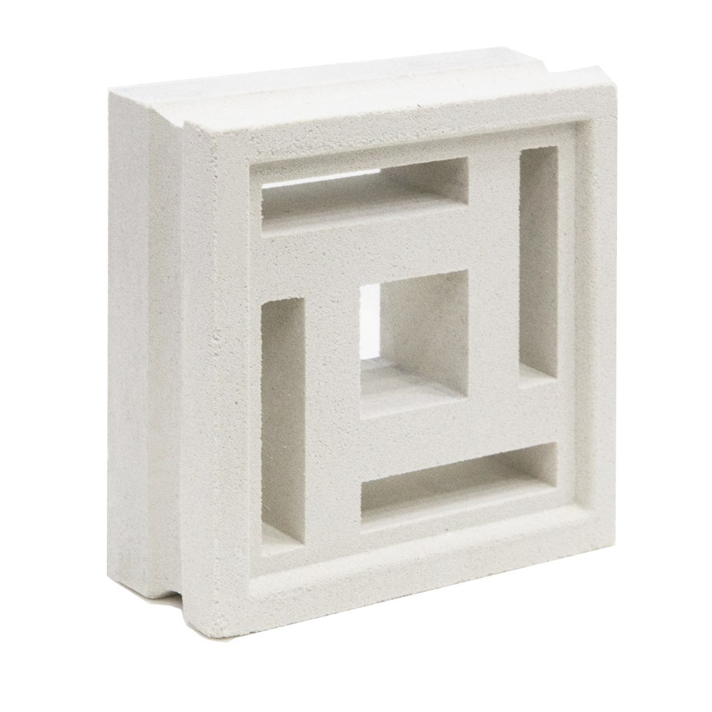 The Carabado Sample by New York Cement Tile is a white breeze block with a geometric square pattern and small center opening.