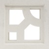 The Caprina by New York Cement Tile is a white square tile with geometric cutouts for a stylish, modern look.