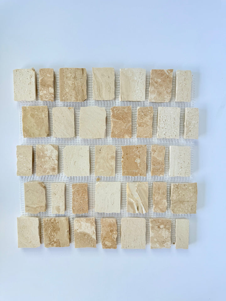 Scarpa I Golden Desert Mosaic Marble Mesh by New York Cement Tile, beige and cream tiles shown on a white background.