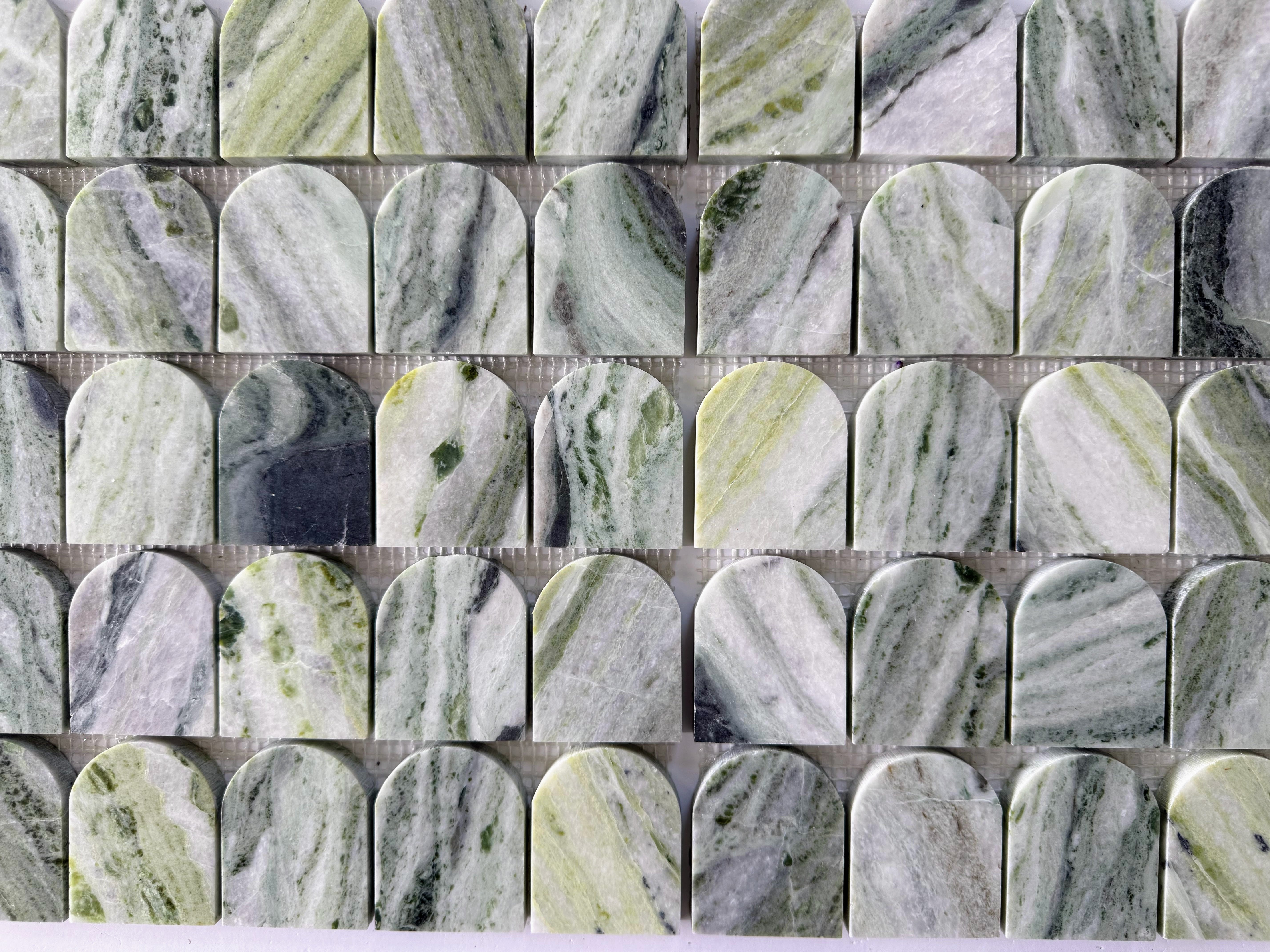 Scarpa I Green Vibes Arch Mosaic by New York Cement Tile: green and gray marble mesh tile with rounded tops, Italian-inspired.