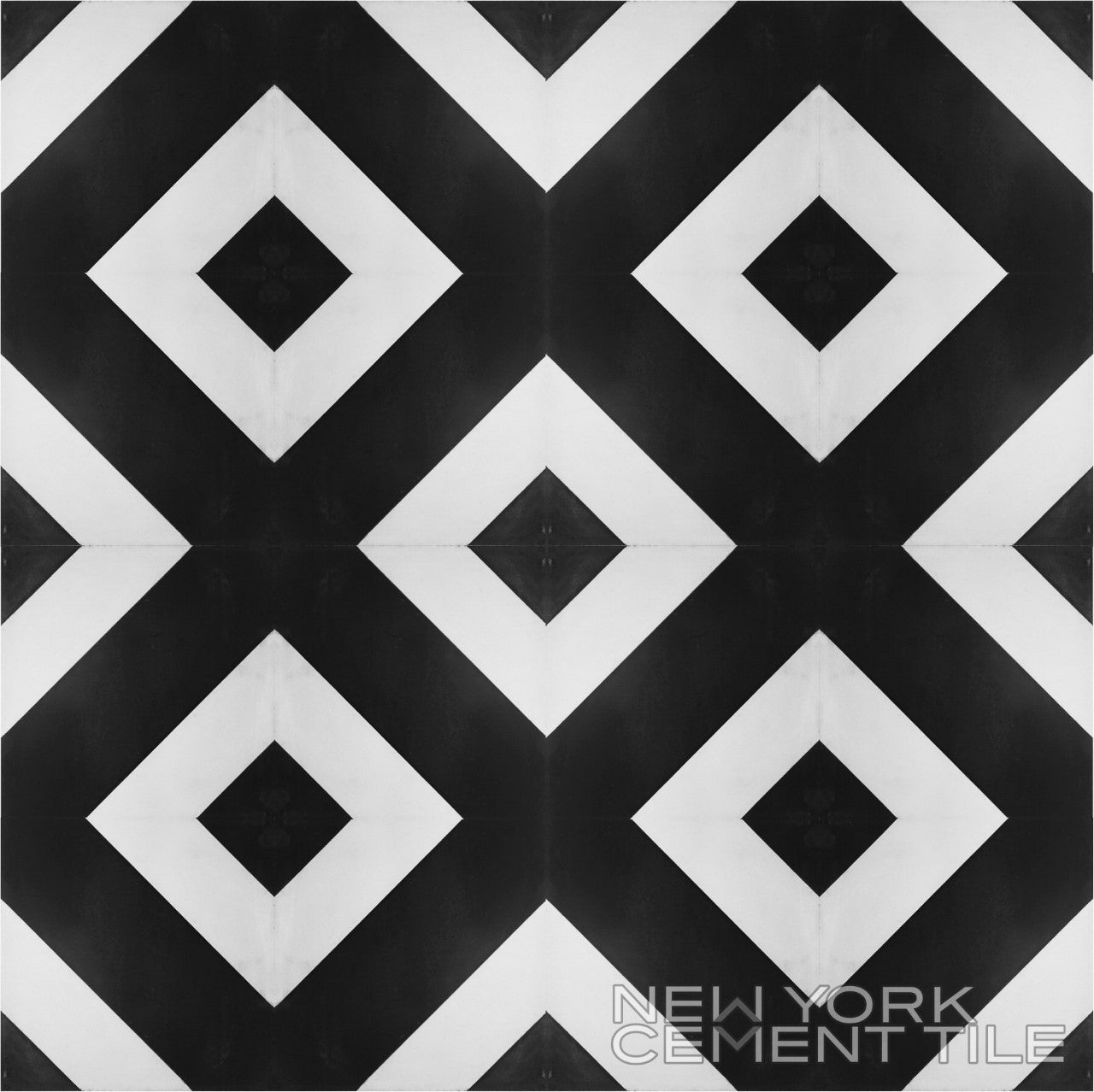N20-232 sample by New York Cement Tile: black & white handcrafted geometric diamond tiles with logo in bottom right.