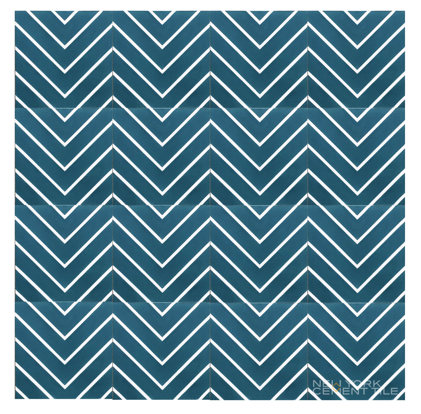 Blue and white N20-437 chevron tile by New York Cement Tile offers a bold zigzag look and durable flooring.