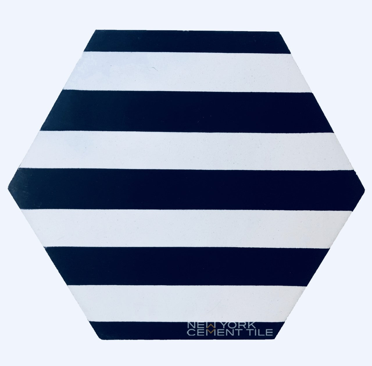 Hexagonal tile, NH23-22 Sample by New York Cement Tile, features black and white horizontal stripes.