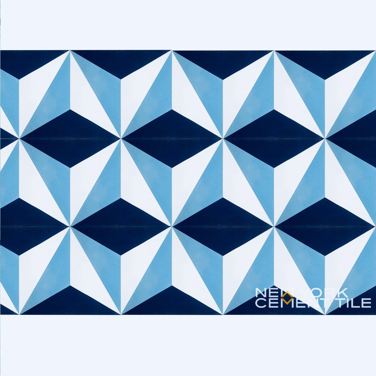 Blue, navy, and white triangle geometric tile pattern; NLT-9 by New York Cement Tile in corner.