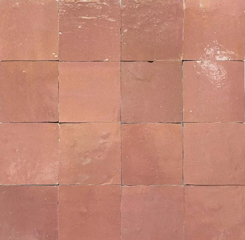 Glazed Copper Rose tiles by New York Cement Tile feature a grid layout with slight texture and copper-red color variation.