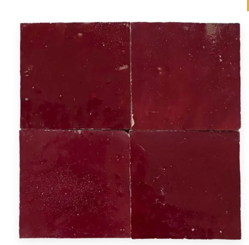 A handcrafted Glazed Sangria 2X2 tile by New York Cement Tile on a white background.