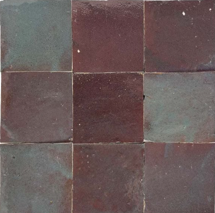 Nine Thistle Sample tiles by New York Cement Tile in a grid, showcasing dark maroon and deep greenish tones.
