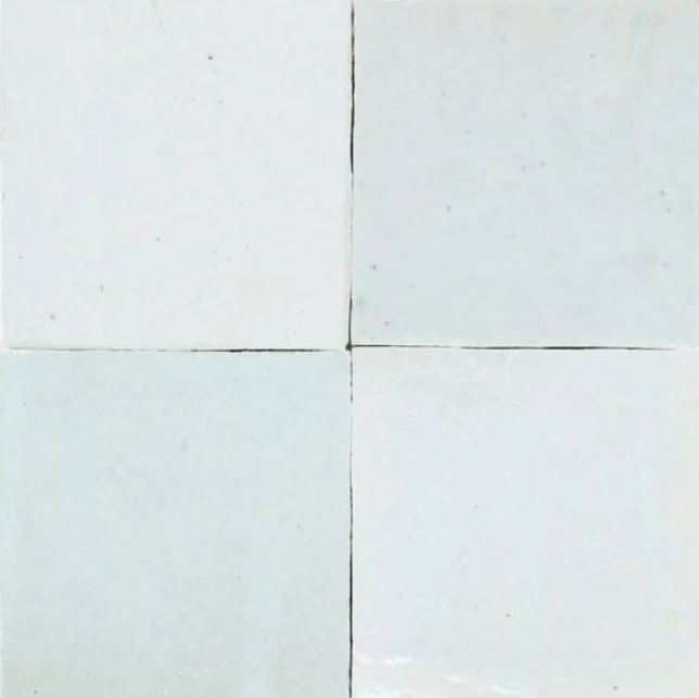 Four Magical Blue tiles by New York Cement Tile arranged 2x2 with visible grout lines.
