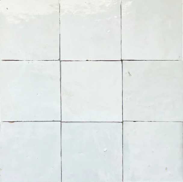 Nine Magical Blue tiles by New York Cement Tile, arranged 3x3 with visible grout lines.