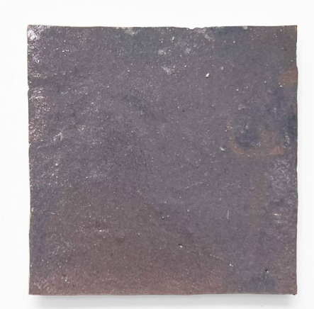 A square Zellige tile in Deep Plum by New York Cement Tile with a white background.