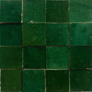 A close-up of Jewel Green by New York Cement Tile, highlighting the beauty of handcrafted Zellige tiles.