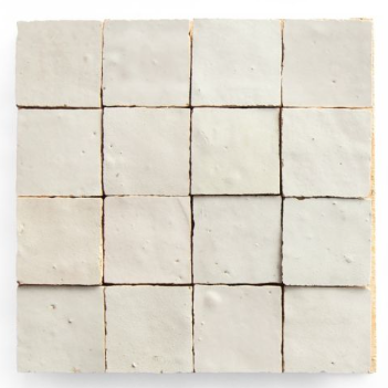 Sixteen Ivory Cloud 2X2 tiles by New York Cement Tile in a 4x4 grid, with uneven surfaces and handcrafted edges.