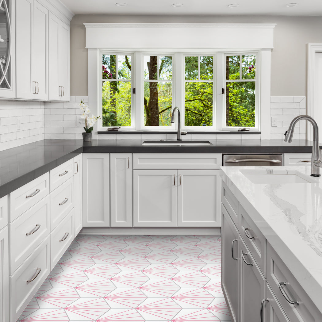Bright kitchen with white cabinets, gray counters, large windows, and NH23-036 by New York Cement Tile on the floor.