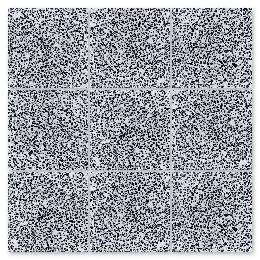 The Terrazzo 12X12-NT30-Leopard sample by New York Cement Tile offers a durable, speckled black, white & gray surface.