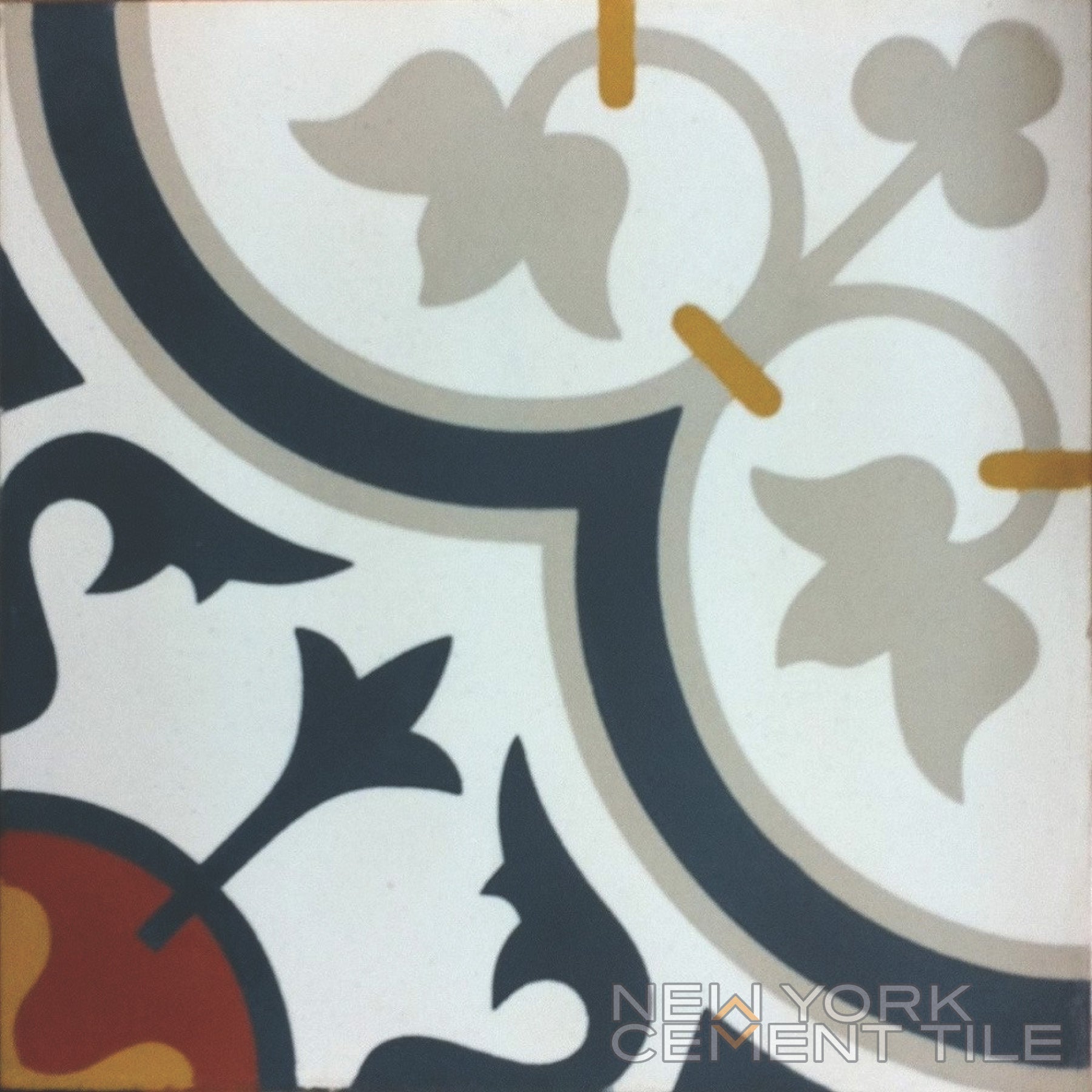 N20-045 sample by New York Cement Tile: decorative cement tile with curved gray, black, and yellow floral patterns.