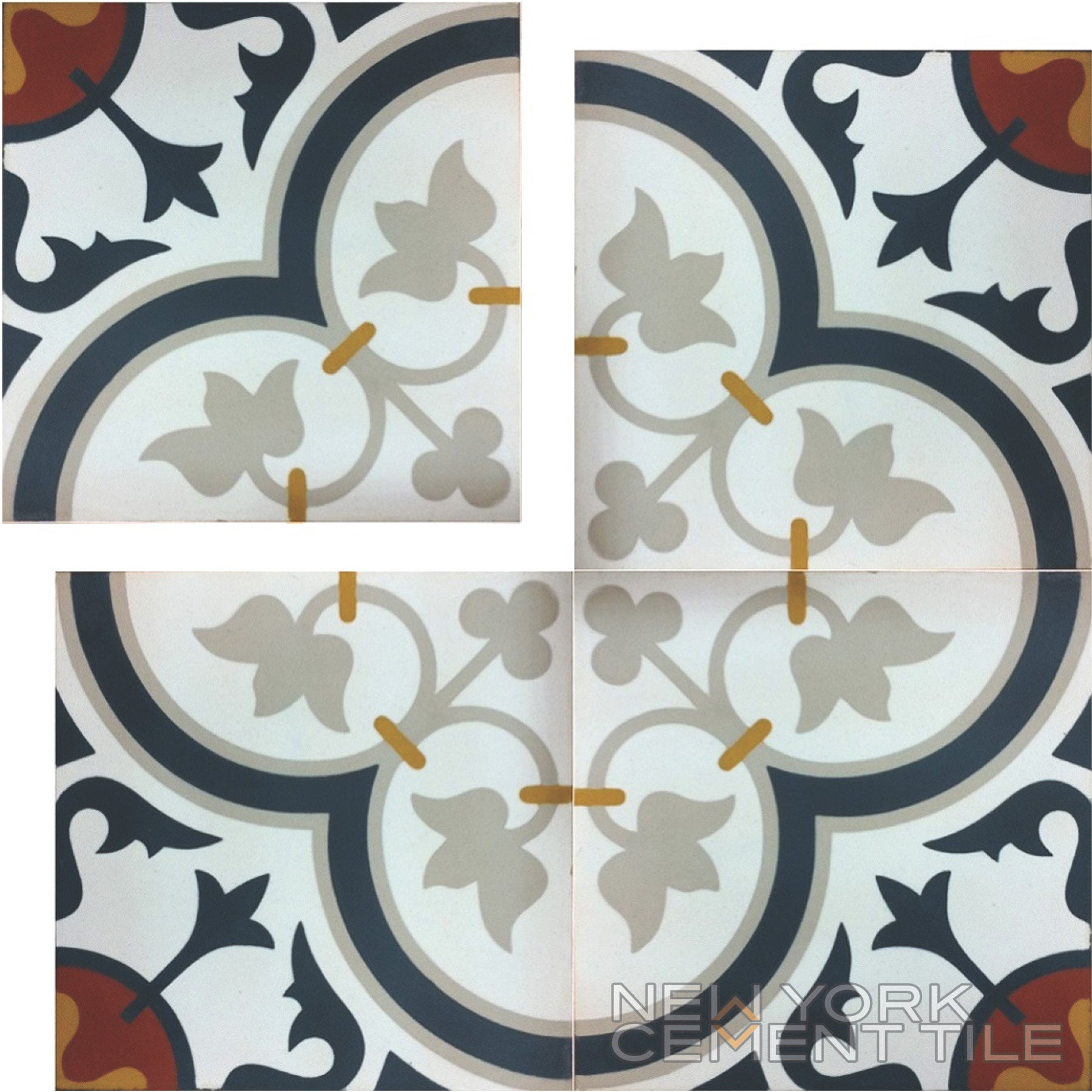 Four N20-045 tiles by New York Cement Tile form a symmetrical floral pattern in gray, black, yellow, and orange tones.