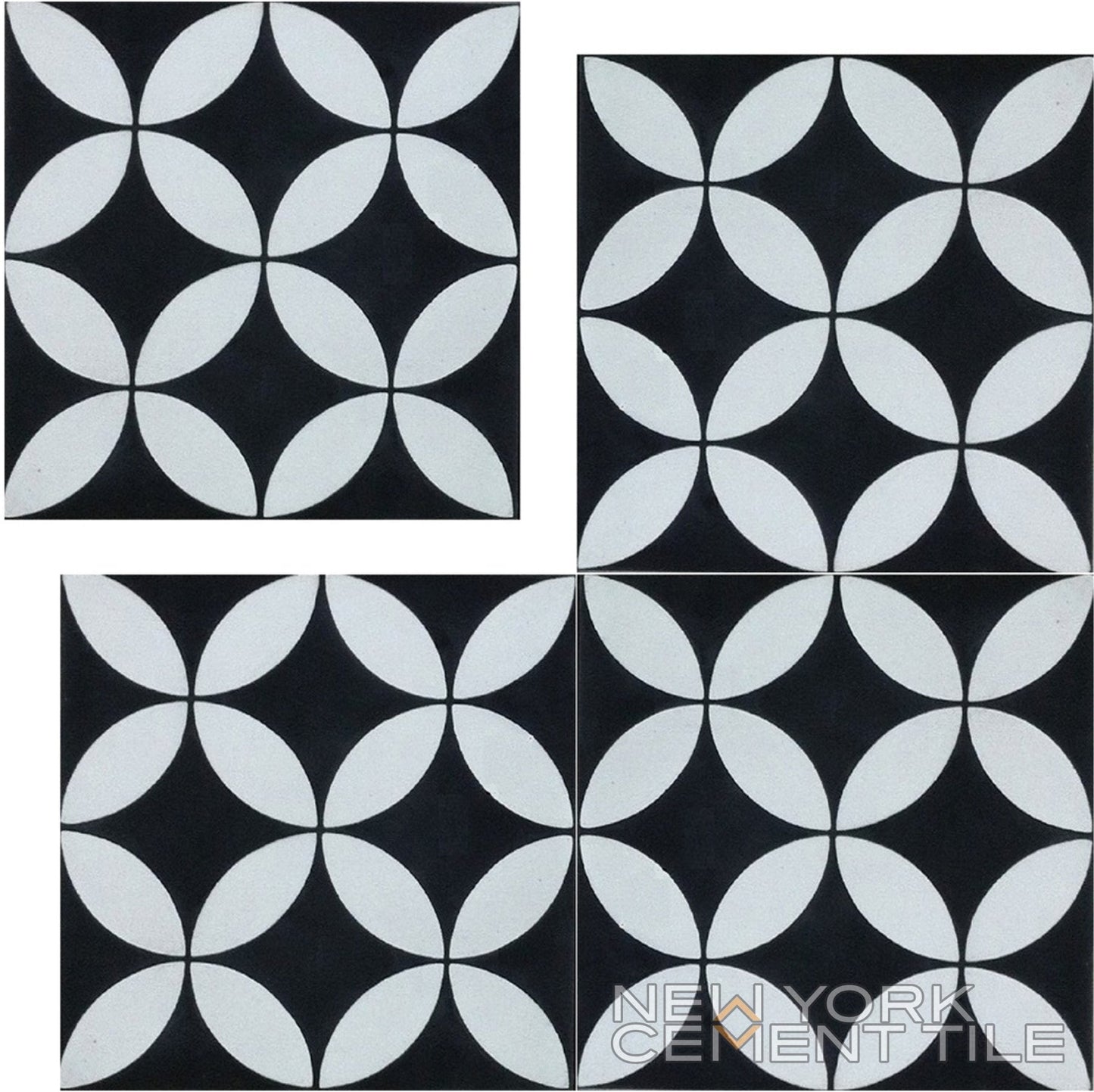 Set of four black N20-061 Extra Sample tiles with white geometric petal design; New York Cement Tile branding in corner.