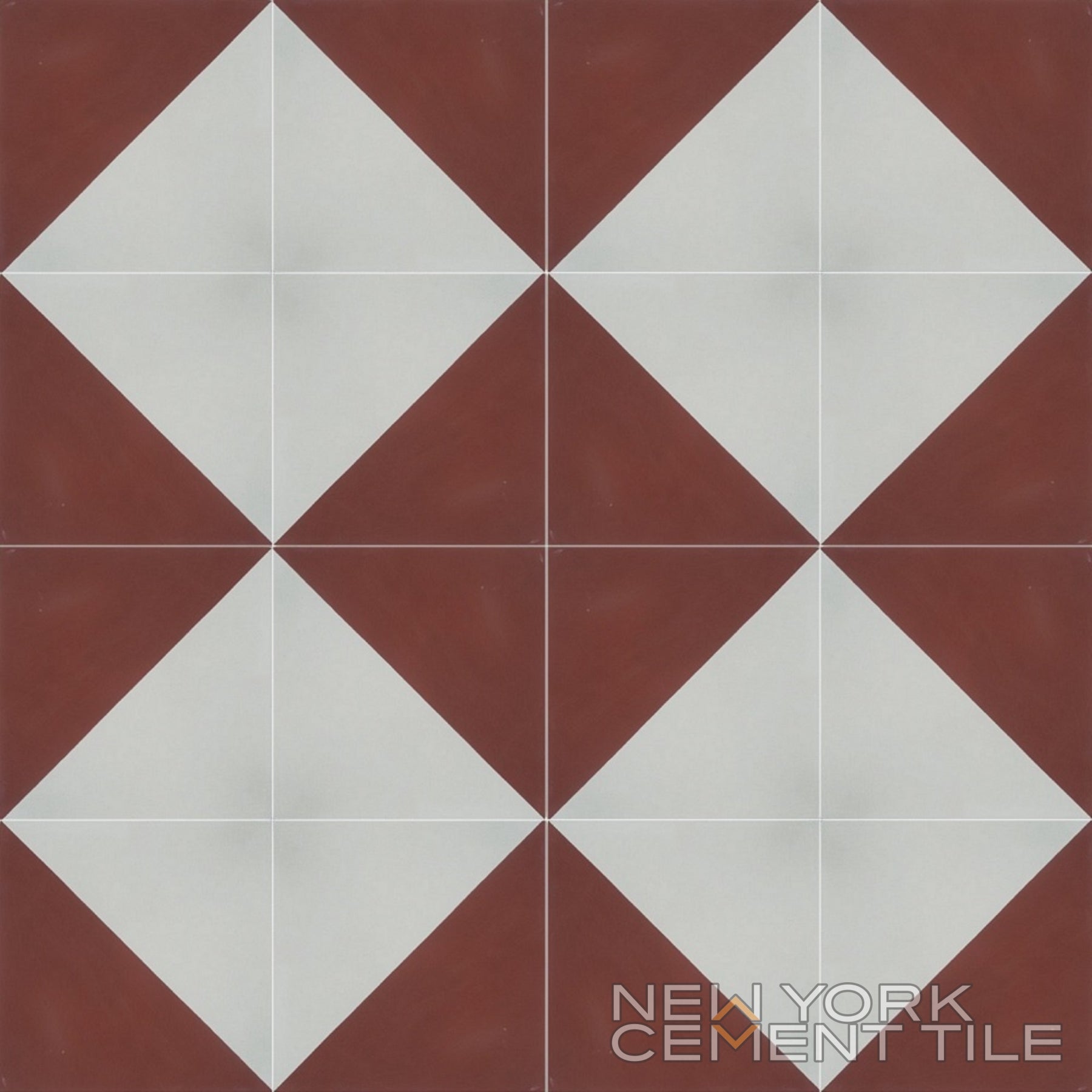 Four cement tiles, N20-139 Sample by New York Cement Tile, with white diamonds, brown corners, and geometric pattern.