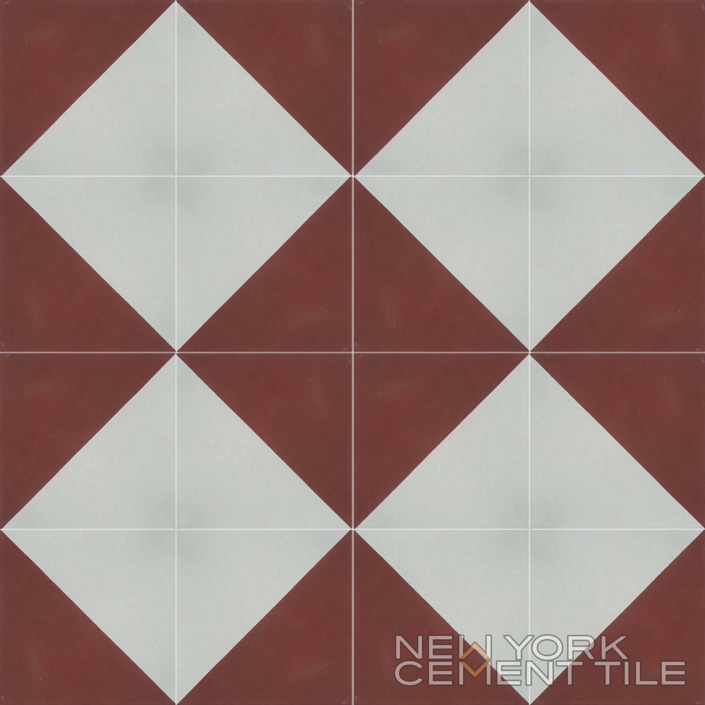 Four cement tiles, N20-139 Sample by New York Cement Tile, with white diamonds, brown corners, and geometric pattern.