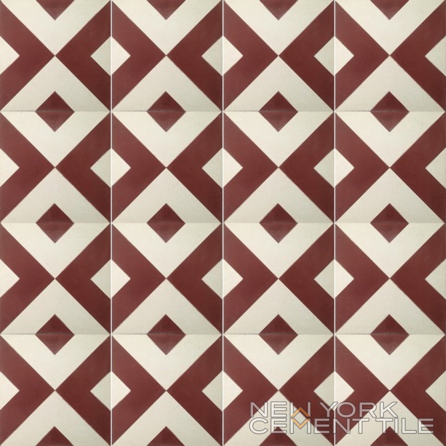 Geometric cement tile sample (N20-184) by New York Cement Tile, with red and cream diamond and triangle patterns.