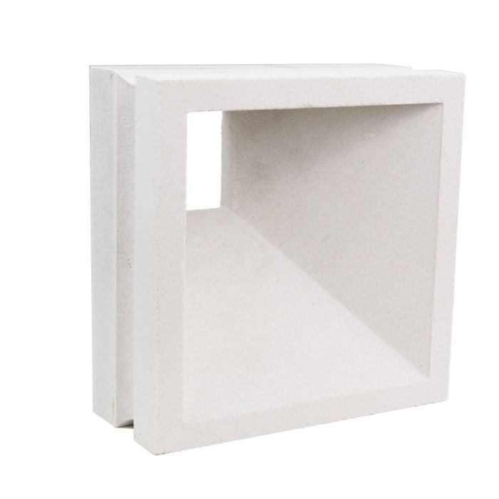The Aku Sample by New York Cement Tile is a white concrete vent block, perfect as a modern geometric decorative partition.