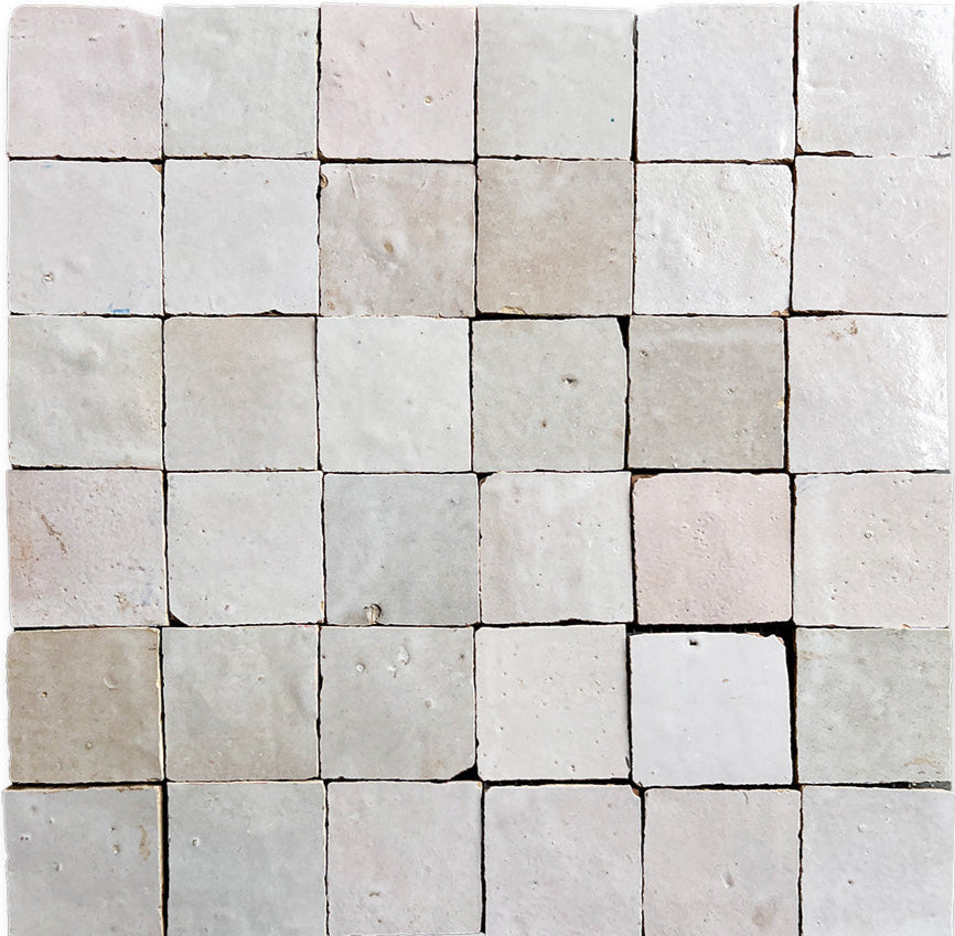 Blushed Glazed 2X2 by New York Cement Tile: neutral square tiles with subtle texture and a grid pattern.
