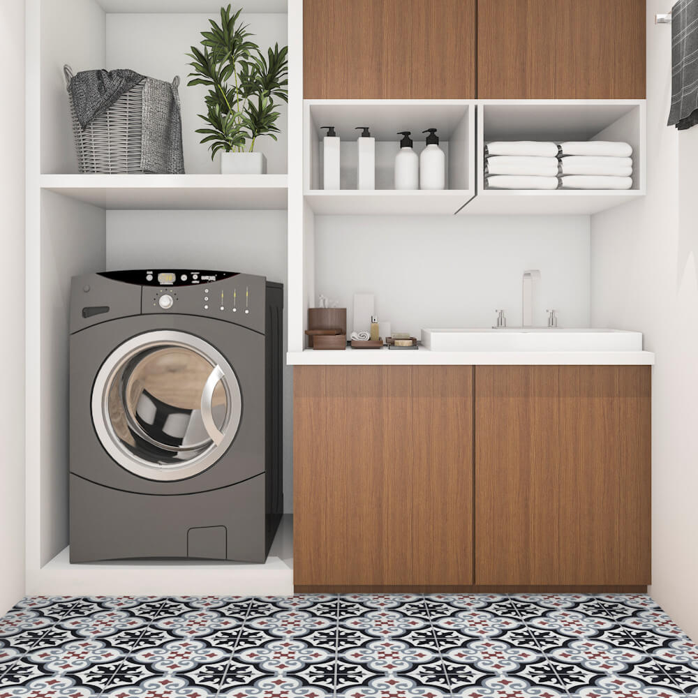 Modern laundry room with gray washer, sink, wood cabinets, shelves, and New York Cement Tile N20-074 BWG&R floor.