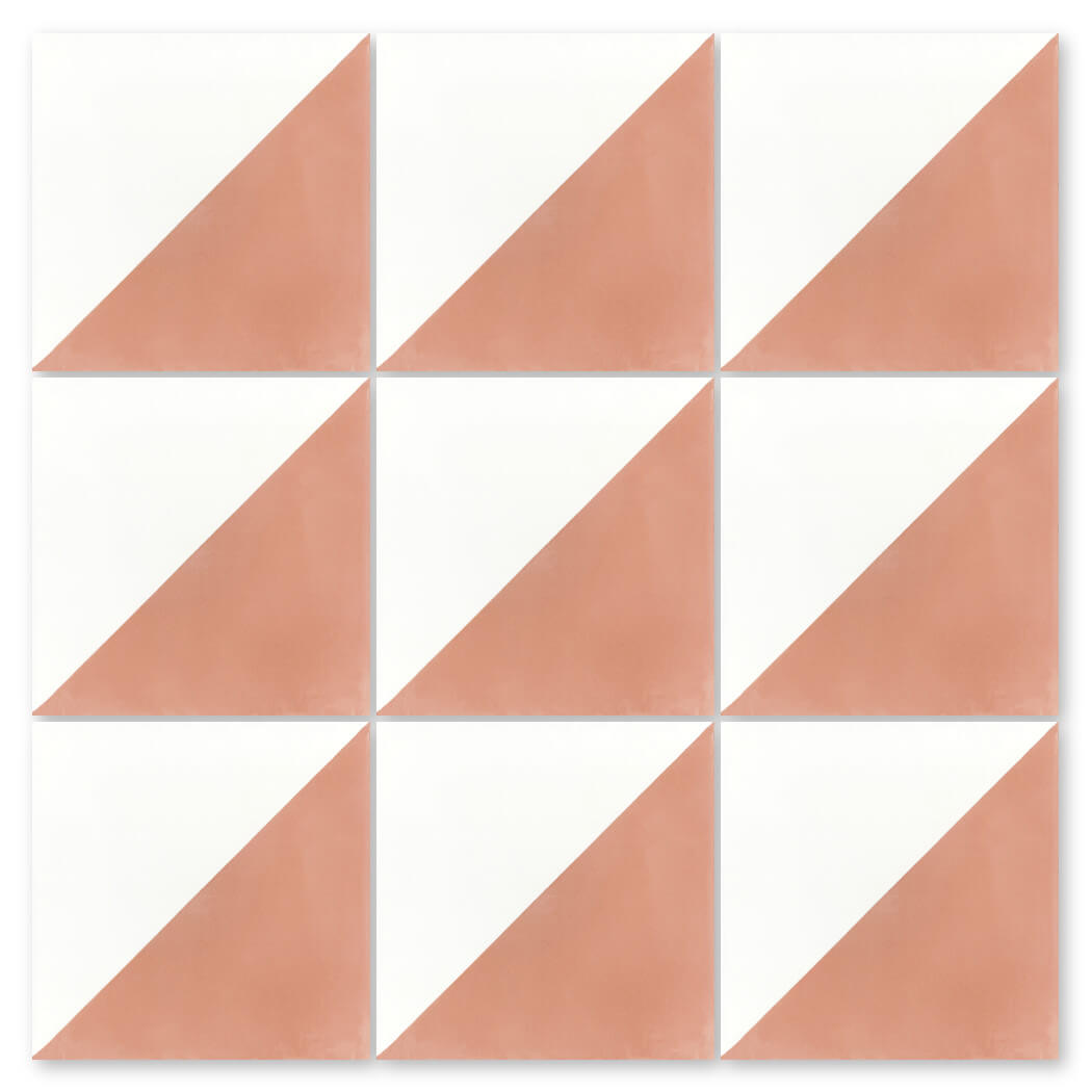 Twelve N20-139 Misty Coral & White tiles by New York Cement Tile, each split diagonally into white and terracotta.