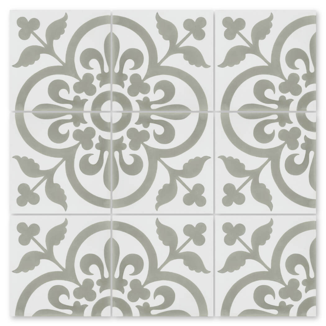 The N20-052 Grey & White Sample by New York Cement Tile has four handcrafted tiles with gray floral and vine patterns on white.