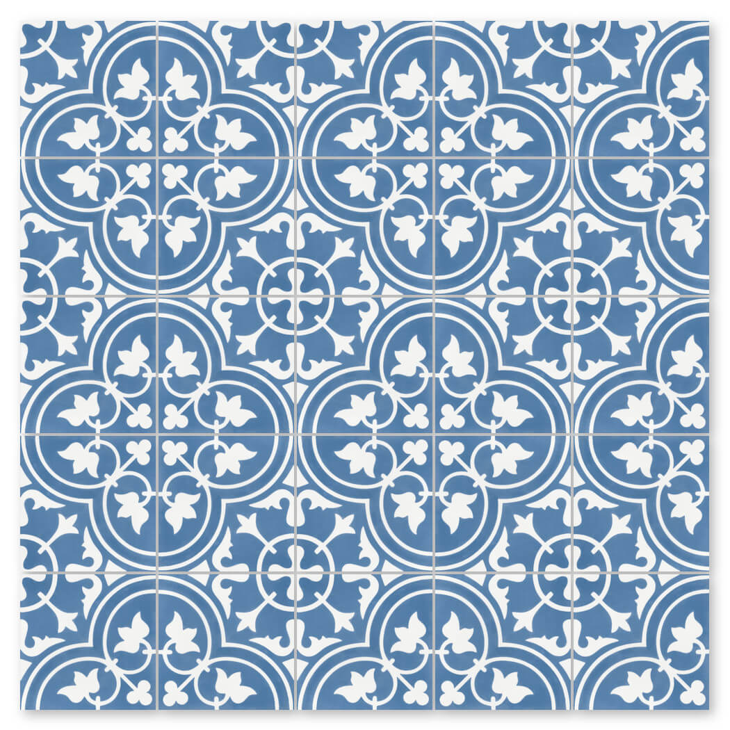 New York Cement Tile N20-045 Royal Blue Sample: blue & white tile with floral, leaf motifs in a repeating geometric design.