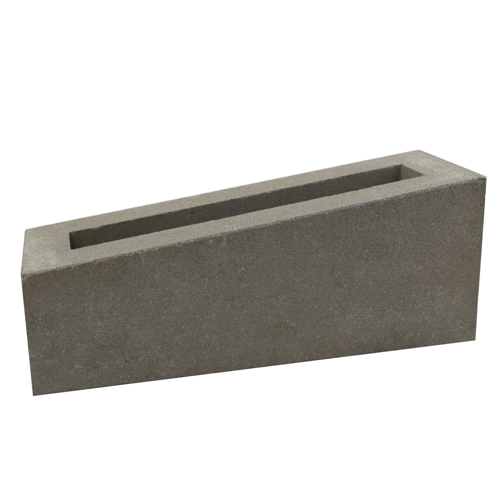 Corsi Sample by New York Cement Tile: a rectangular breeze block with a slanted top and a rectangular hollow center.