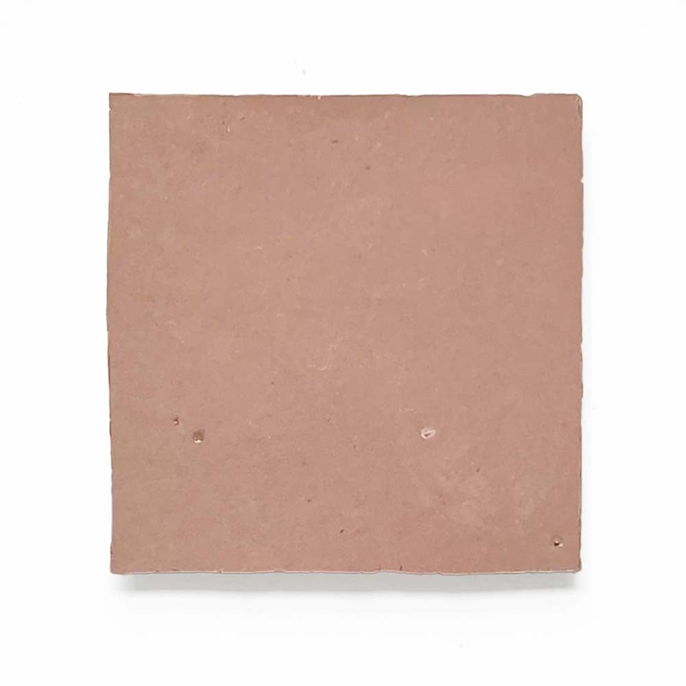 Warm Peach tile sample by New York Cement Tile: a light brown, square, handcrafted tile with a smooth surface.