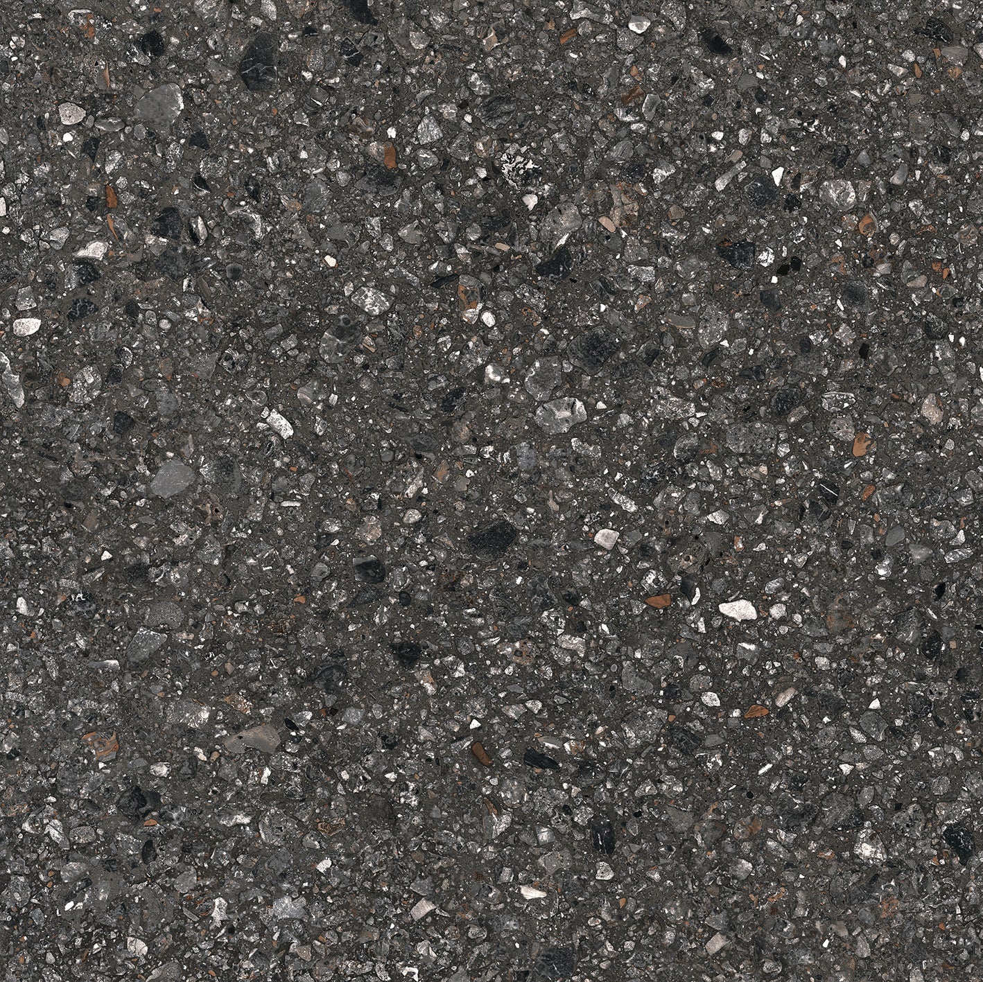 Close-up of Dye - Perenne - Sample by New York Cement Tile, featuring a dark, textured modern paving surface.