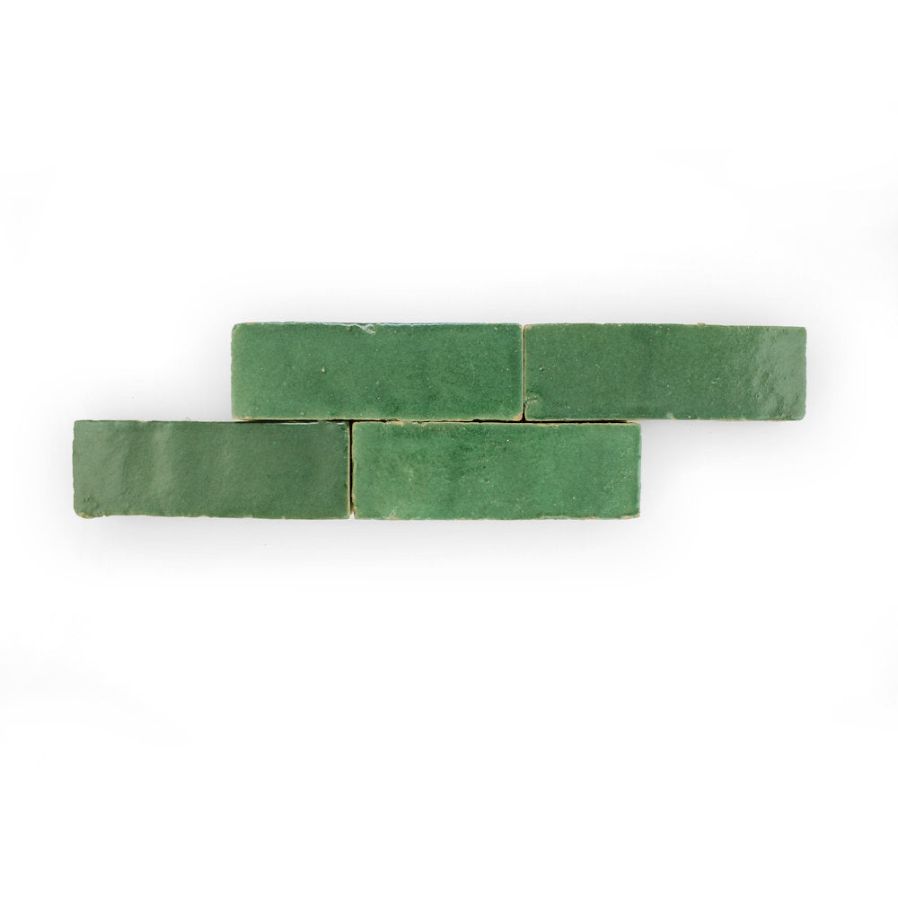 Four Forest Green (2x6) tiles by New York Cement Tile, arranged staggered on a white background.