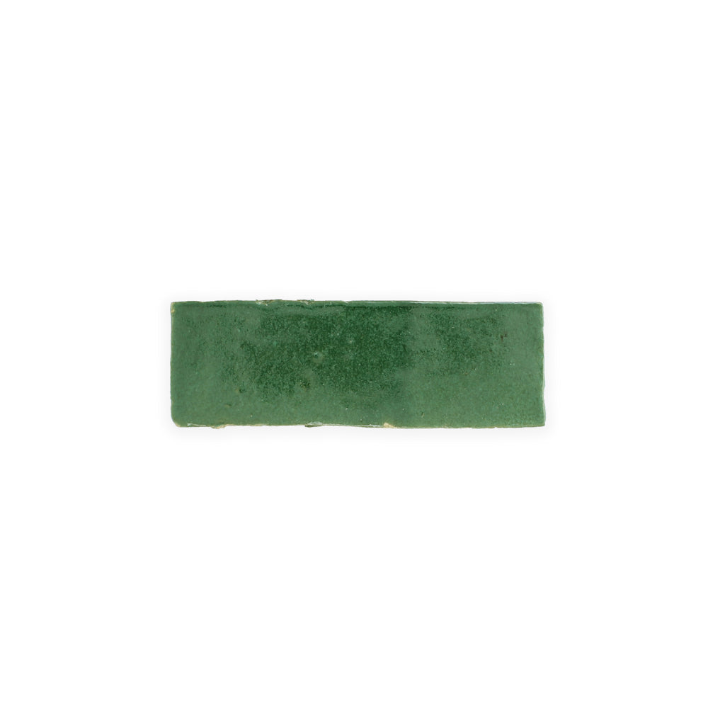 A single Forest Green (2x6) tile by New York Cement Tile, seen from above on a plain white background.