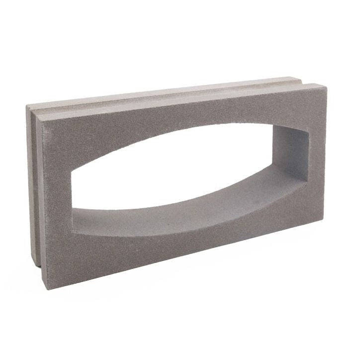 Gili Rectangular Sample by New York Cement Tile: gray concrete block with central oval opening, standing upright.