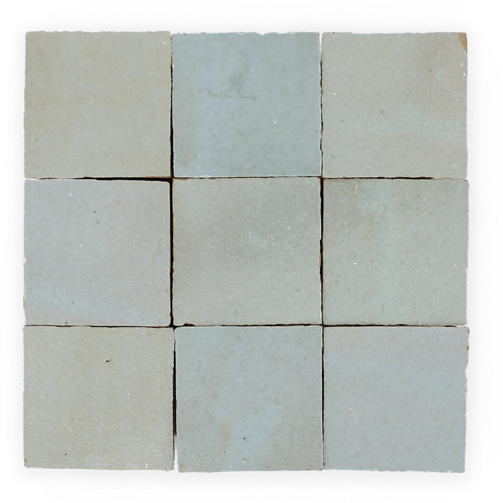 Nine Arctic Blue2X2 tiles by New York Cement Tile arranged in a 3x3 grid on a white background.