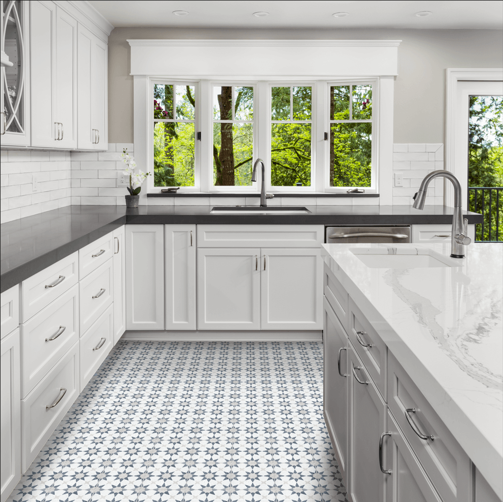 Modern kitchen with white cabinets, black countertops, and terrazzo flooring by New York Cement Tile, NT20-271 Sample.