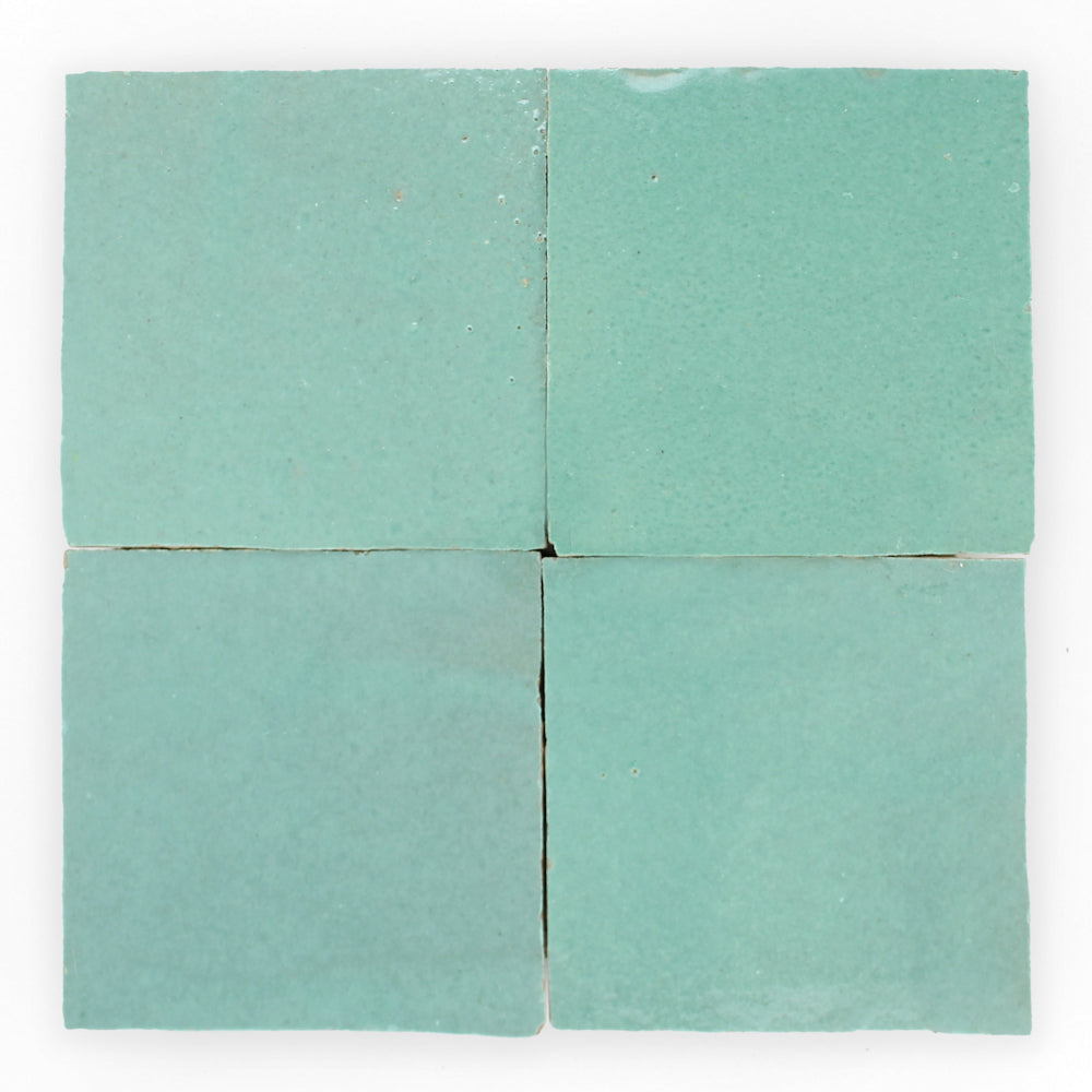 Seafoam 2x2 Extra Sample by New York Cement Tile—four Zellige tiles in light teal, perfect for kitchen backsplashes.