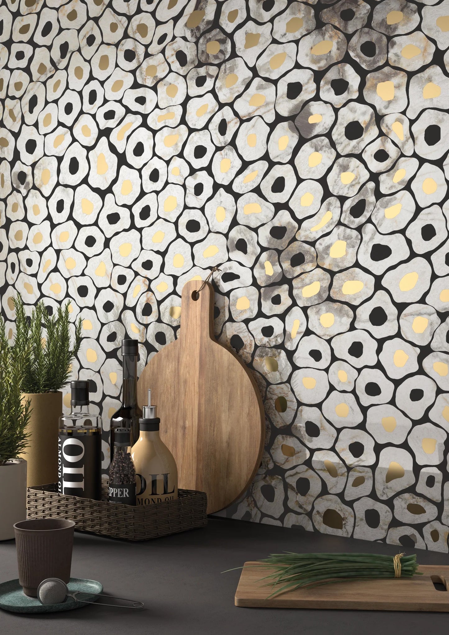 Kitchen counter with olive oil, herbs, and a wall of bold Jag gold glazed tile by New York Cement Tile in an abstract pattern.