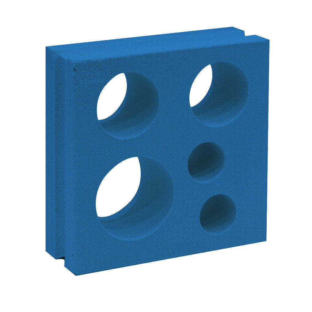 Jami by New York Cement Tile: a blue rectangular foam block with four circular holes, inspired by breeze blocks.